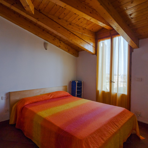 The bedroom at Milan Skyline Apartment