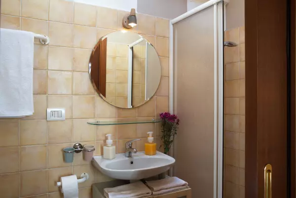 Mirror in the bathroom of Milan Skyline Apartment