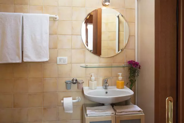 Mirror in the bathroom of Milan Skyline Apartment