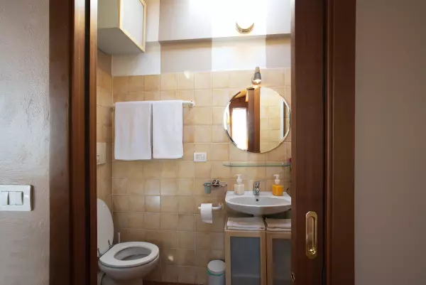 Toilet in the bathroom of Milan Skyline Apartment