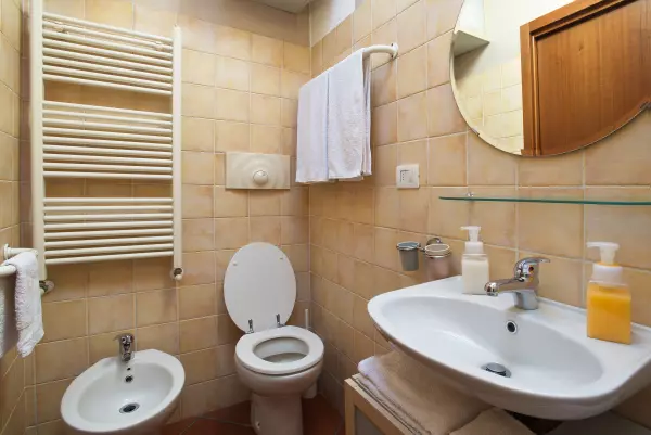 Toilet in the bathroom of Milan Skyline Apartment