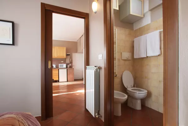 Toilet in the bathroom of Milan Skyline Apartment