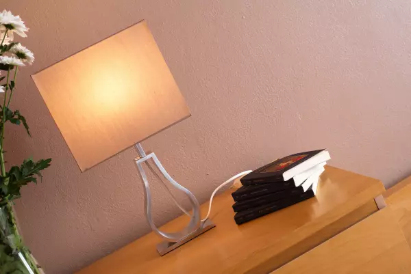 The bedside table in the bedroom