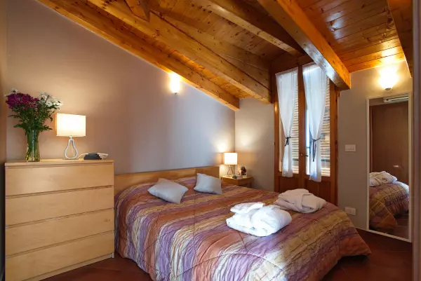 The double bed in the bedroom