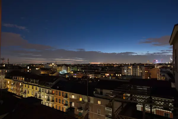 Night view over Milan's neighbourhoods from the terrace
